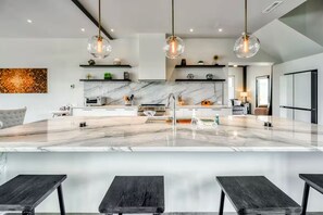 Fridge, microwave, oven, stovetop - Lakefront Luxury Villa w/ Infinity Pool, Swim Spa (Bumpass)