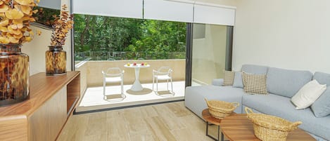 Standard Apartment, 1 Bedroom, Balcony, Garden View | Living area