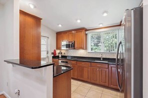 Fridge, microwave, oven, stovetop - Modern DC City Home in McLean (McLean)