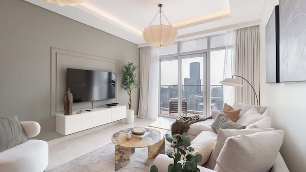 A modern living room with a flat-screen TV, a white sofa, a marble coffee table, and a large window offering a city view. - Stayshort - Lovely 3 Bed in Downtown Sleeps 5 With Balcony (Dubai)