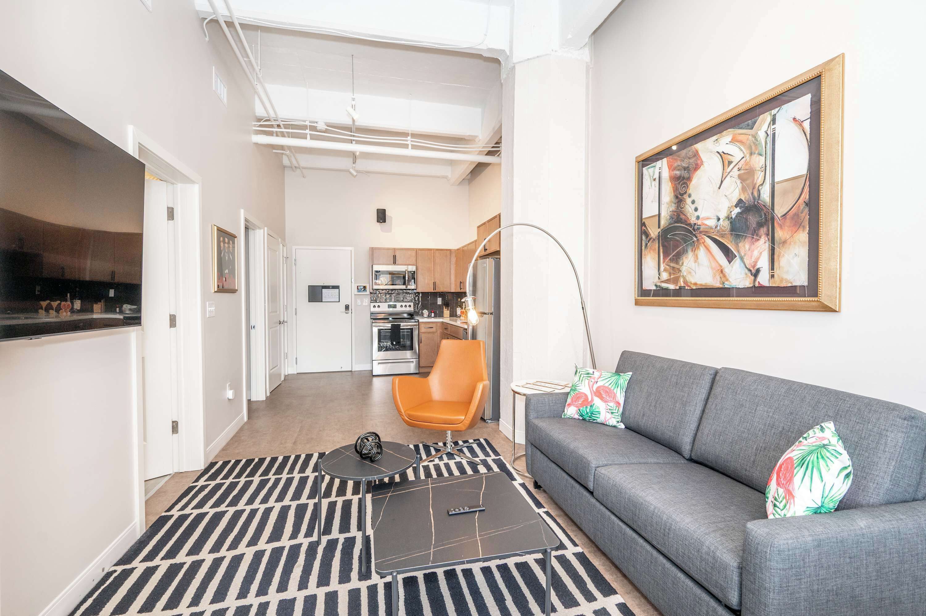 Apartamento, várias camas, cozinha, vista para a cidade (The 333 Suites) | Área de estar