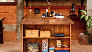 A rustic interior with wooden shelves, a coffee station, and various decorative items. - 4 Beds. Villa, Pool, Oceanview (Puerto Ángel)