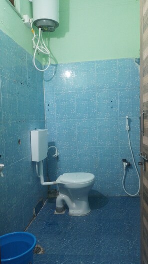 Comfort Quadruple Room, City View | Bathroom - Sri Sri Residency  (Mantralayam)