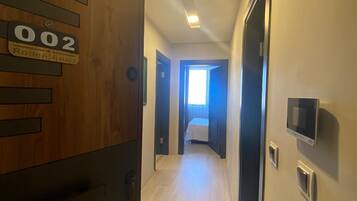 Family Apartment, Balcony, Garden View | Blackout drapes, soundproofing, iron/ironing board