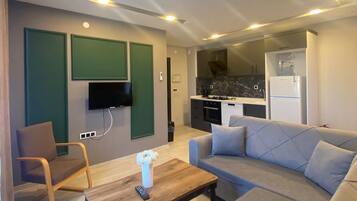 Family Apartment, Balcony, Garden View | Blackout curtains, soundproofing, iron/ironing board