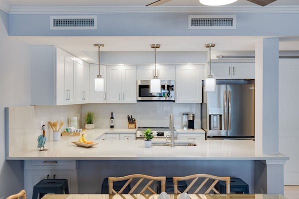 Fridge, microwave, oven, stovetop - Villa Sanibel 1B - 10 Footsteps to the beach! (Sanibel)