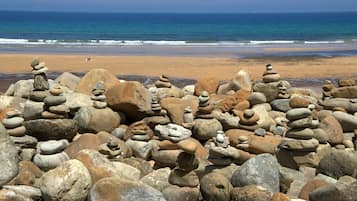 Solsenger og strandhåndklær