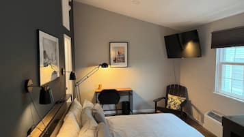 1 dormitorio, tabla de planchar con plancha, wifi y ropa de cama