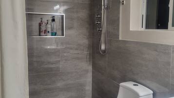 Shower, towels, soap, shampoo