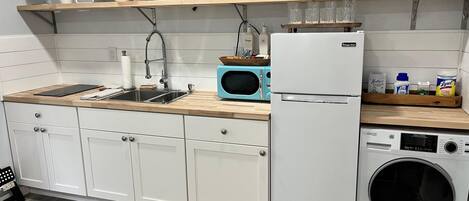 Fridge, microwave, stovetop, coffee/tea maker