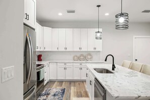 Townhome, Multiple Beds, Patio, City View (1906 W Cherry St, 2) | Private kitchen - New Build in Old West 3 Bed, 2 Bath Family Rental (Tampa)