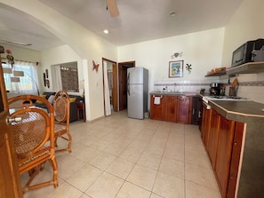 Fridge, microwave, coffee/tea maker, toaster - MARAVILLA: Spacious 1-bedroom apartment with AC in charming Celestún. (Celestún)