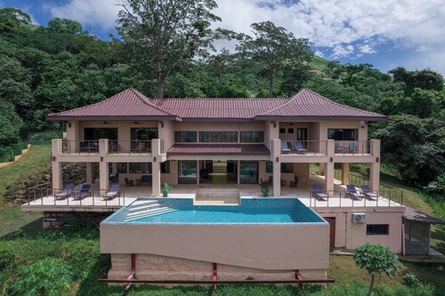 Custom Hillside Villa overlooking the Pacific surrounded by wildlife