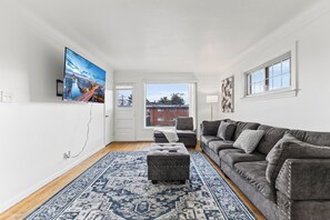 Living area - Bright & Stylish 2BR with Private Parking & Minutes to Downtown (Detroit)