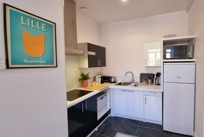 Microwave, stovetop, coffee/tea maker, toaster