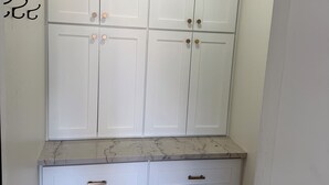 A white wardrobe with two drawers and a marble countertop. - Newly Remodeled Mesa Oasis with a Sparkling Pool—Move-In Ready & Stunning! (Mesa)