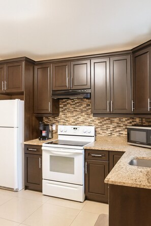 Private kitchen - Executive 2BR Lower Suite · Private & Spacious/Near US Border (Windsor)