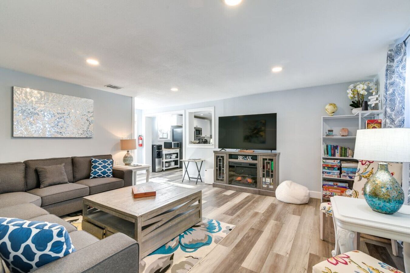 TV, fireplace, books