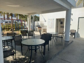 Outdoor dining - Quiet house in gated community with A/C and Pool (Paseo de las Palmas II)