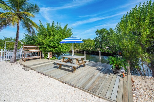 Updated Canal Home with Dock for 25' Boat, Sandbar Access & Backcountry Fishing