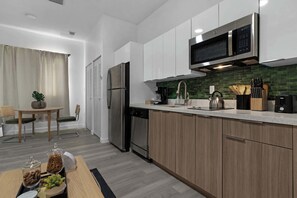 Fridge, microwave, stovetop, dishwasher - Walk to Wynwood Walls - Rooftop Pool - New Condo (Miami)