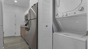 Mini-fridge, microwave, stovetop, cookware/dishes/utensils