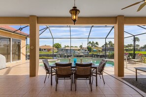 Outdoor dining - Villa Aveline - Stunning Sailboat Access electric heated pool home - SWFL Rentals (Cape Coral)