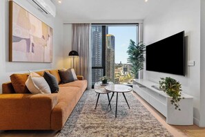 Smart TV, books - The Queensbridge Building New 2bd Designer Suite (Melbourne)