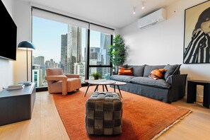 Smart TV, fireplace, books - Modern Nostalgia Vintage Cool Modern Luxury (Melbourne)
