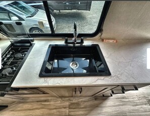 Interior - Cozy 1-bedroom recreational vehicle in delightful Orlando with AC (Orlando)