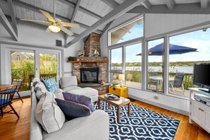 TV, fireplace - Charming Waterfront Escape Along the Cove (Eastham)