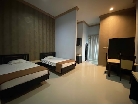 Habitación Deluxe con 2 camas individuales. Hotel O near Universitas Palangka Raya