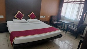 Habitación de lujo | Camas supletorias y ropa de cama