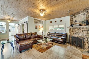 TV, fireplace, books