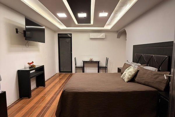 1 chambre, fer et planche à repasser, Wi-Fi gratuit, draps fournis