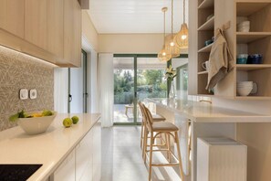 Fridge, dishwasher, electric kettle, cookware/dishes/utensils