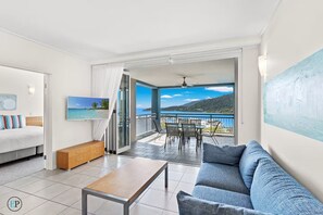 Living area - Whitsunday Oceans! Infinity Pool, Restaurant, Gym, Spa bath and Coral Sea View!! (Airlie Beach)