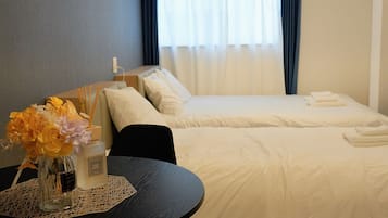 Japanese-style Triple Room, Multiple Beds, Non Smoking, Private Bathroom | Blackout drapes, free WiFi