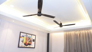 A ceiling with two ceiling fans and recessed lighting. - Hotel Shri Ram Ratan Inn (Ayodhya)