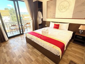 Habitación doble superior | Caja de seguridad en la habitación y cortinas blackout