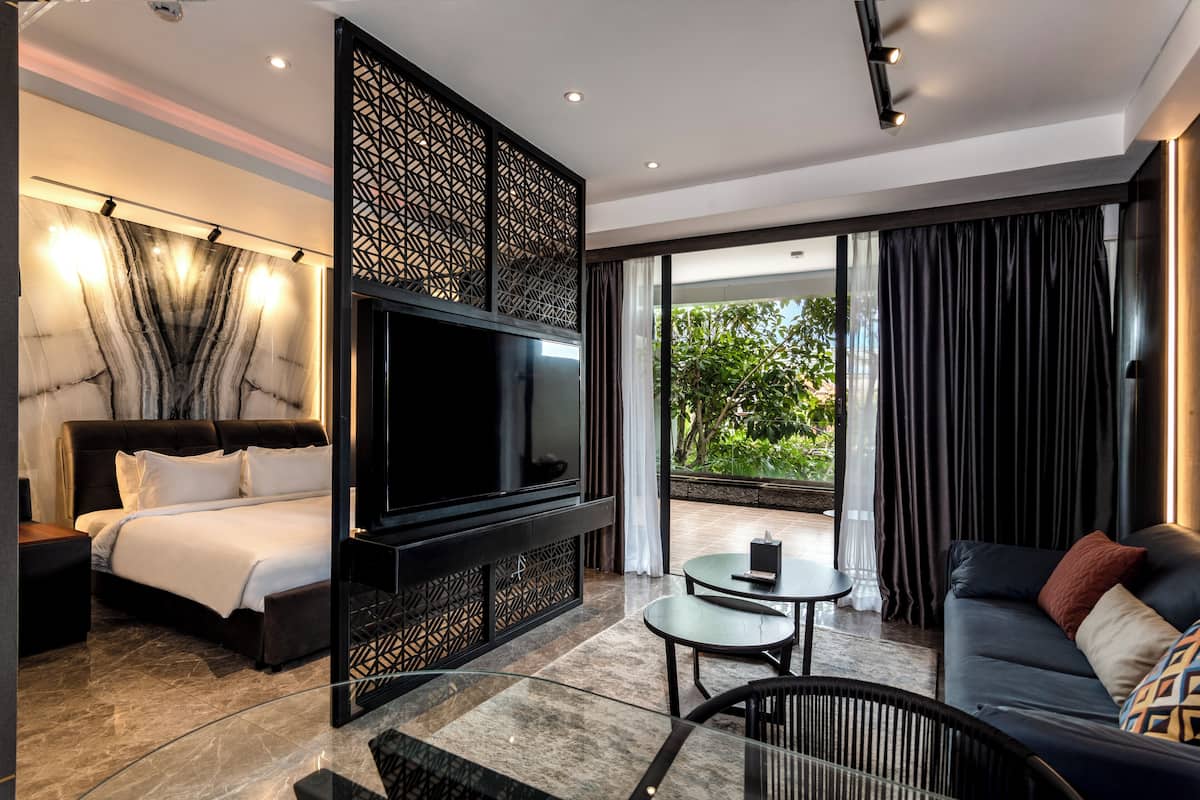 Suite estudio Deluxe, 1 cama de matrimonio grande, vistas al jardín | Escritorio, espacio para trabajar con un portátil, wifi gratis