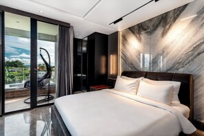 デラックス スタジオスイート キングベッド 1 台 シティビュー | 高級寝具、ピロートップベッド、客室ごとに異なる装飾、客室ごとに異なるインテリア