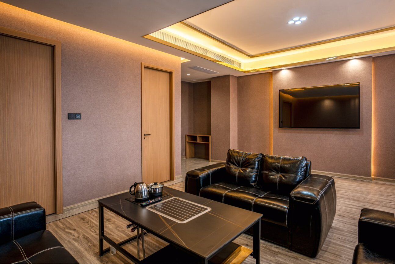 Deluxe Suite, City View | Desk, laptop workspace, blackout drapes, iron/ironing board