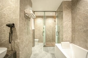 Deluxe Suite, City View | Premium bedding, down duvets, desk, laptop workspace