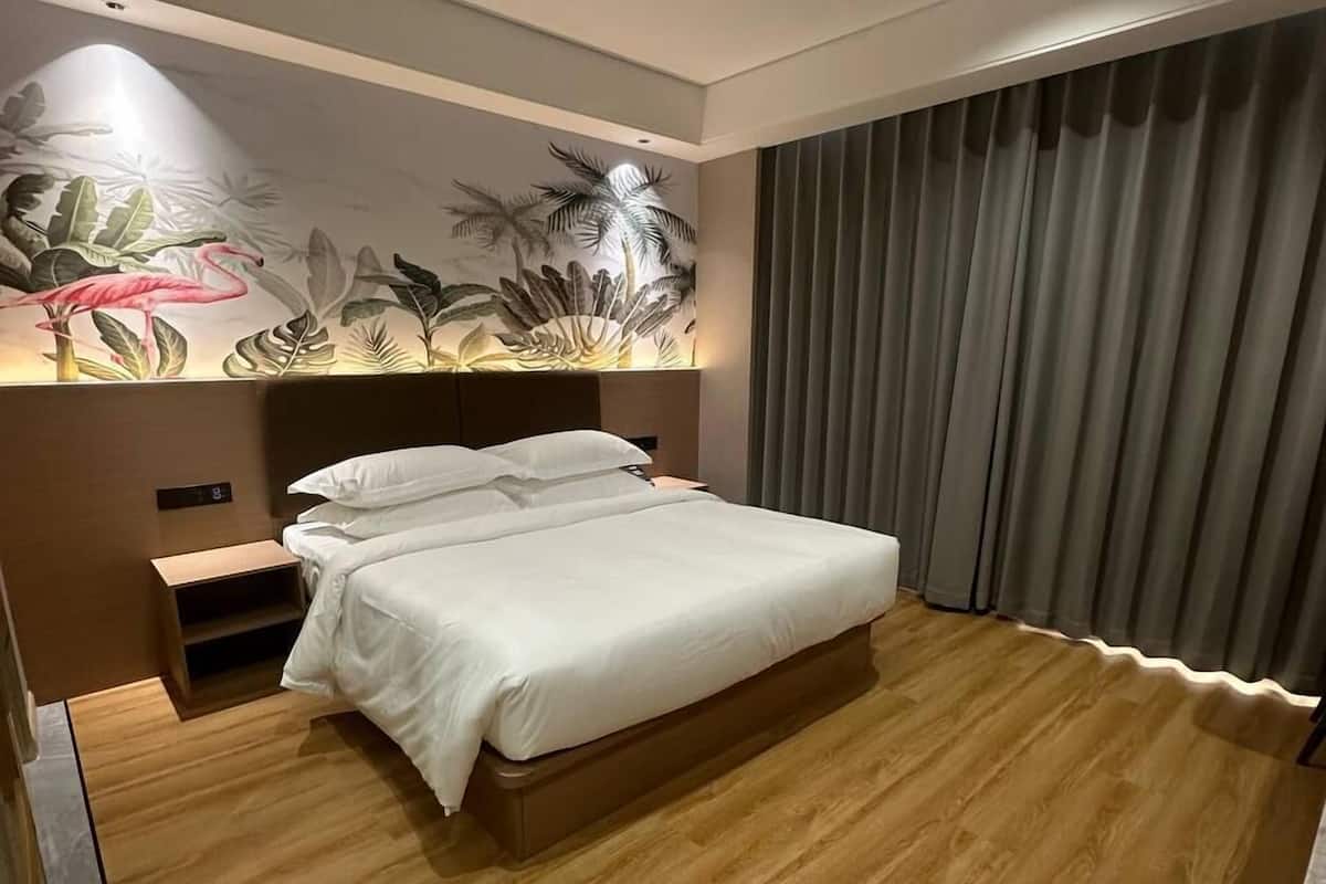 Desk, laptop workspace, blackout drapes, iron/ironing board