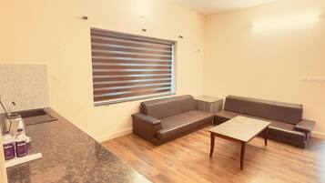 Suite Familiale, vue montagne | Coin séjour