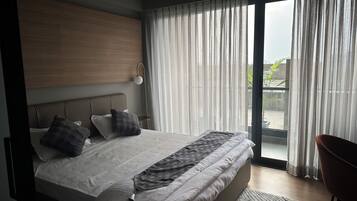Superior Studio, Balcony, City View | Iron/ironing board, free WiFi