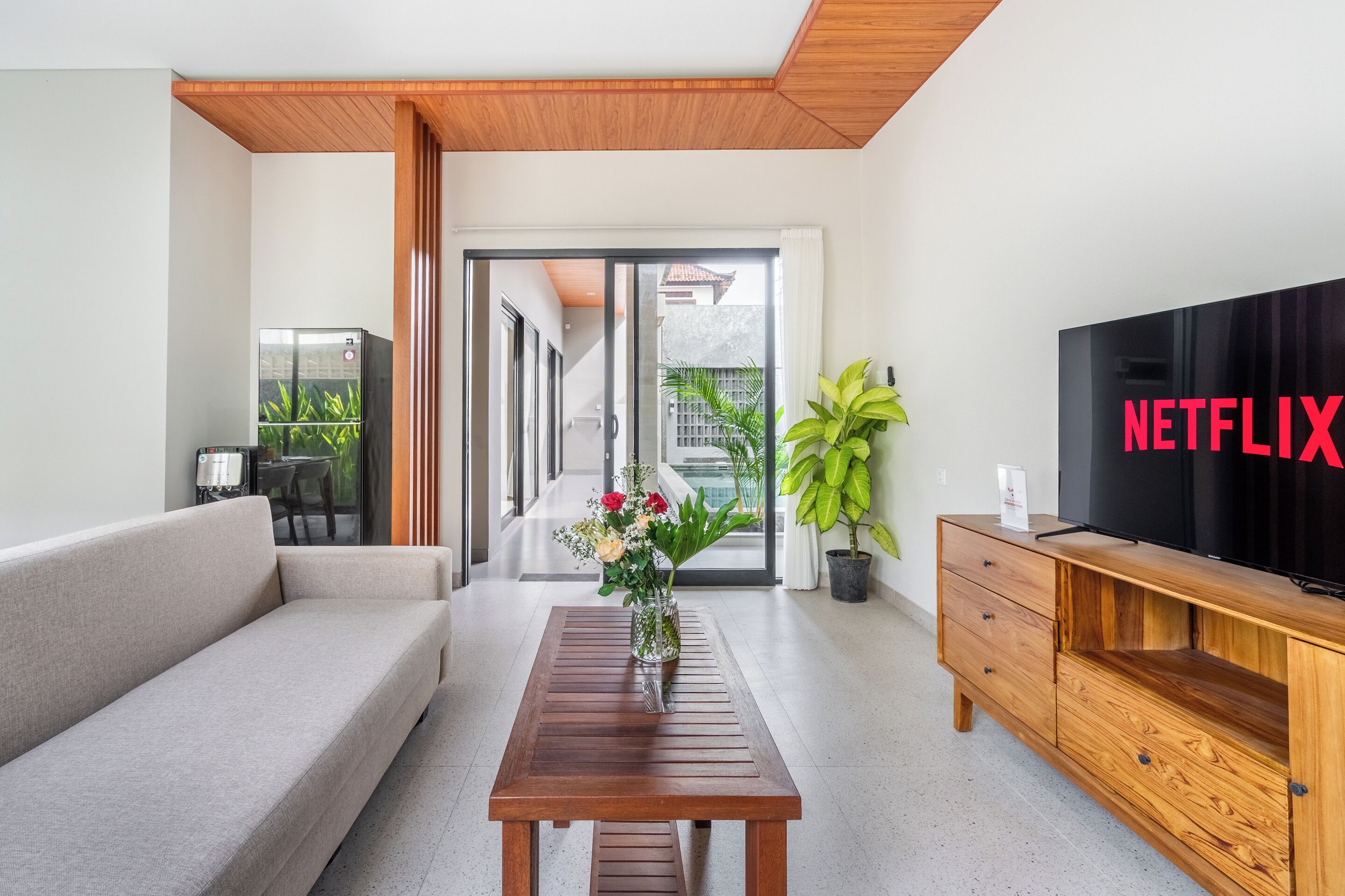 Family Villa, Garden View | Living area | 50-inch Smart TV with cable channels, Netflix, streaming services