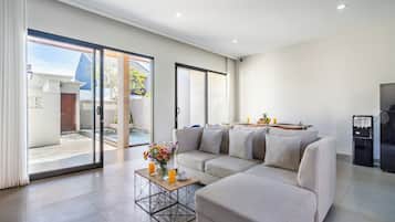 Exclusive Villa | Living area | 50-inch Smart TV with cable channels, Netflix, streaming services