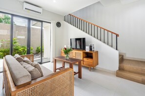 Villa Familiale, vue jardin | Coin séjour